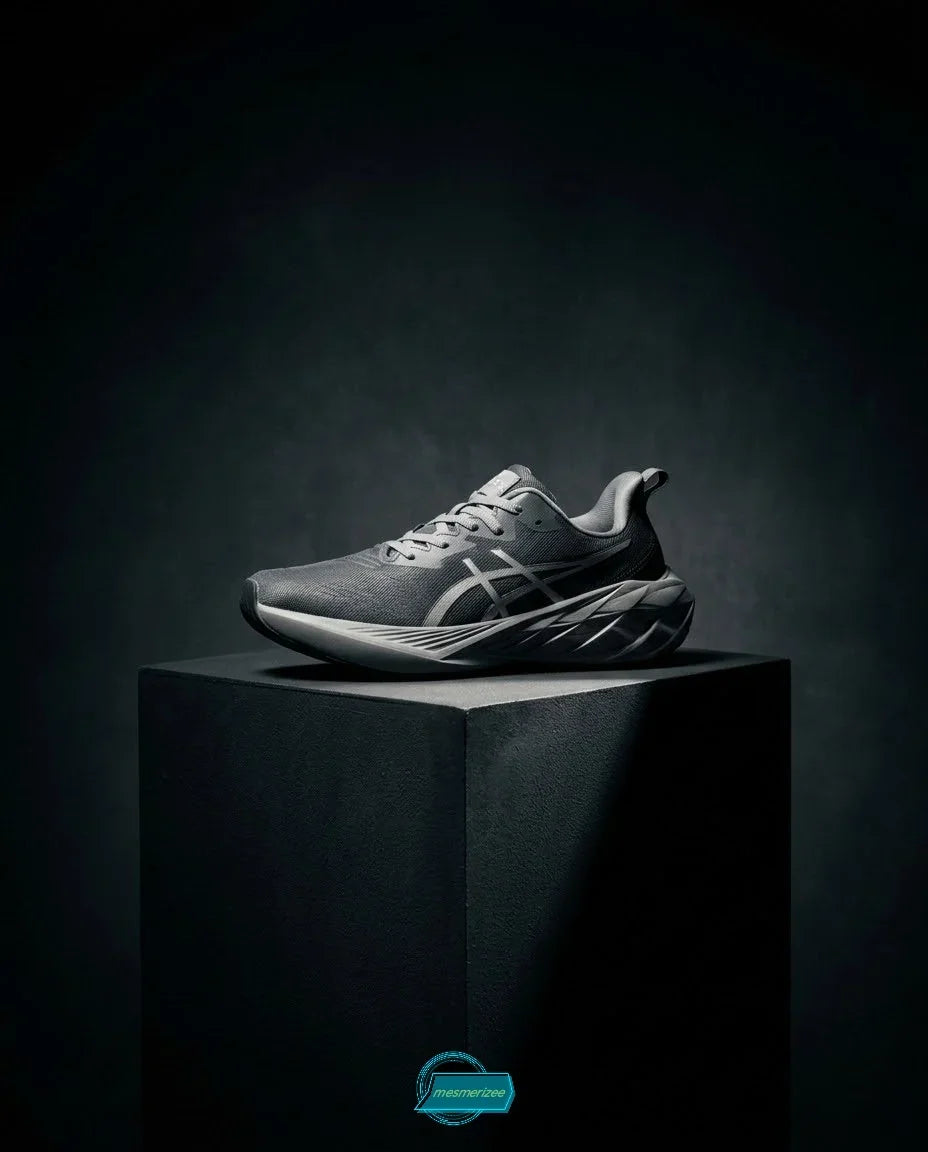 Grey premium running mesh sneakers for men on a dark pedestal.
