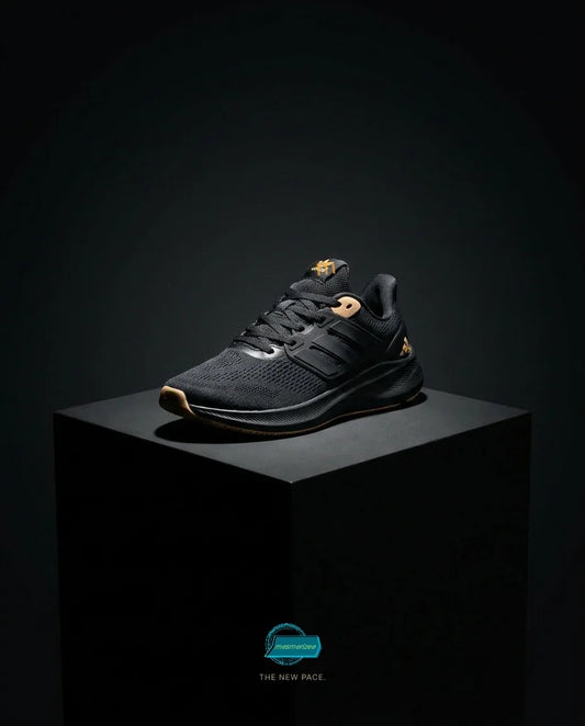 Mesmerizee premium black running mesh sneakers for men on a black pedestal.