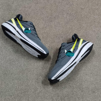 Pair of grey Mesmerizeecom premium running mesh sneakers for men on a grey surface.