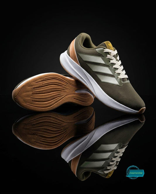 Green premium men's sneakers with white soles and brown accents by Mesmerizee